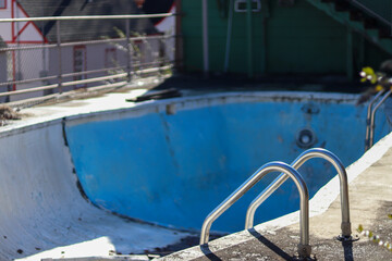 Old empty abandoned pool at motel