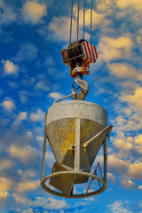 Working at height equipment with bucket liquid concrete container with hanging on crane hook