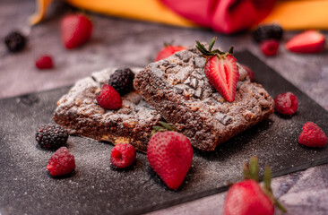 healthy food concept, selective focus on strawberry and raspberry dishes, natural desserts