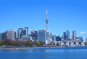Toronto's downtown skyline along Lake Ontario, with office buildings and apartment buildings viewed from the west.