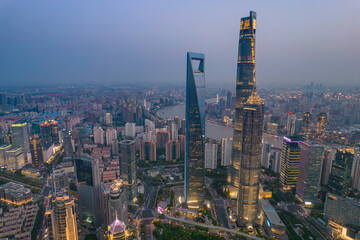 Obraz premium Night view of Lujiazui, the financial district in Shanghai, China, aerial shot.
