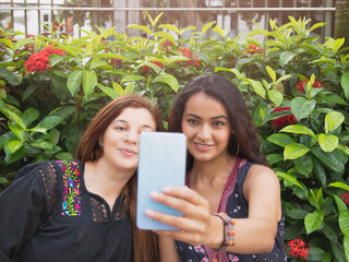Two Female Friends Taking Selfie