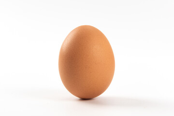 Raw brown chicken eggs on white background