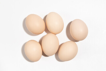 Raw native chicken eggs on white background