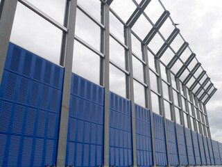 SELANGOR, MALAYSIA - JULY 5, 2020: Noise barriers are installed along the vehicle lane bordering...