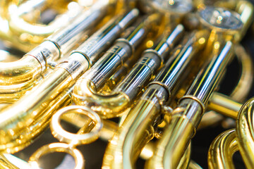 photo detail of a golden French horn
