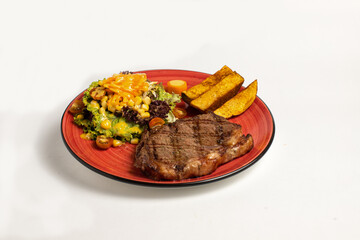 Beef steak with salad and fries