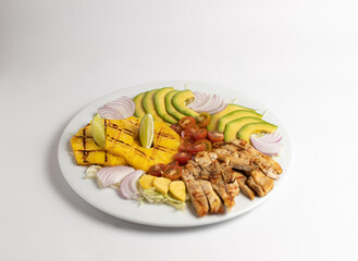 Grilled chiken breast fillet with veggies and pineapple