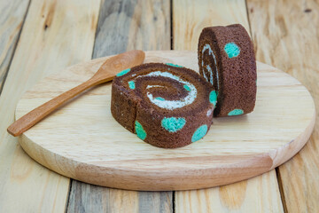 Different types of bread and bakery on a wooden background
