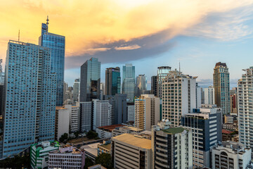 Fototapeta premium Sunset at Makati commerical area, Metro Manila, Philippines, Feb 22, 2021