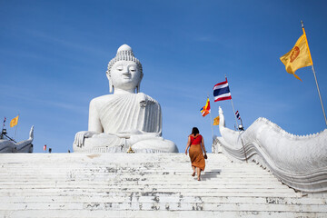 Statue of Big Buddha with a blue sky background in Phuket, Thailand.
