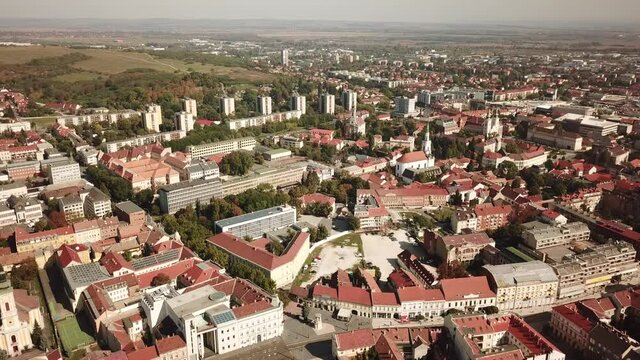 Cinematic aerial drone dolly footage of downtown Miskolc, fourth largest city and a major industrial hub, Northern regional center of Hungary, capital of Borsod-Aba&uacute;j-Zempl&eacute;n county