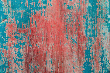 Brightly colored but fading paint of some small shops and houses at popular tourist resort / Fading Colors / Painted wooden walls of some shops and house fronts in Bali 