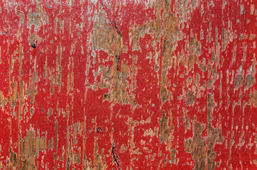 Brightly colored but fading paint of some small shops and houses at popular tourist resort / Fading Colors / Painted wooden walls of some shops and house fronts in Bali 