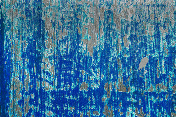 Brightly colored but fading paint of some small shops and houses at popular tourist resort / Fading Colors / Painted wooden walls of some shops and house fronts in Bali 