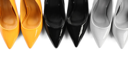 Different high heels on white background