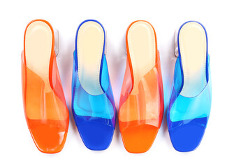 Different sandals on white background