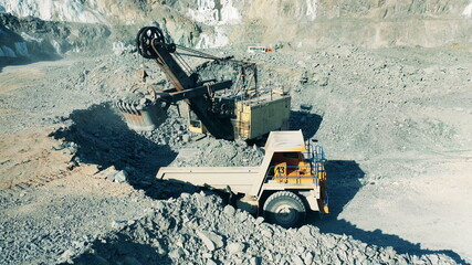 Mining machines are extracting copper ore in the quarry