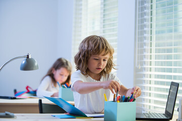 Education and learning. Schoolboy and schoolgirl in classroom. Back to school. Knowledge day.