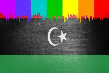 Paint (rainbow flag) is dripping over the national flag of Libya