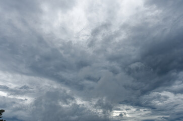 A view of mountain under gloomy clouds with rain in distant sky background cloudy in Si Nan National Park, Nan, Thailand