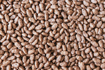 Chocolate rice background close up view
