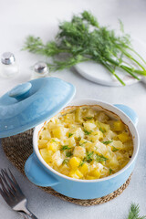 Roast in a pot with potatoes and fish, selective focus