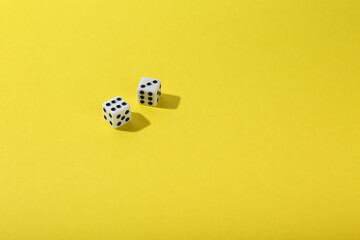 game dice on color background top view with copy space