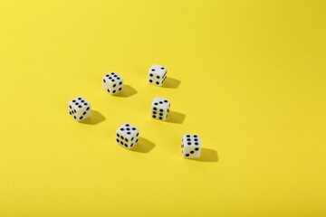 game dice on color background top view with copy space