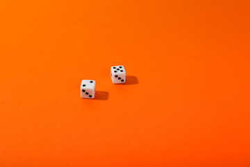 game dice on color background top view with copy space