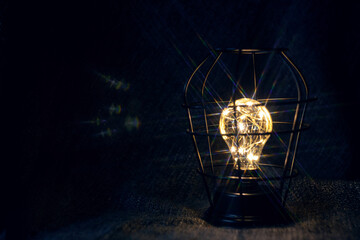 Fototapeta na wymiar light bulb in the dark