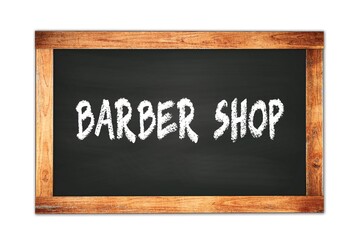 Obraz premium BARBER SHOP text written on wooden frame school blackboard.