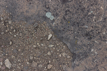 Rock texture. Big stone with stone sand. On the photo we can see beautiful stone-sand combi texture. One part of photo - stone, other part - sand. 