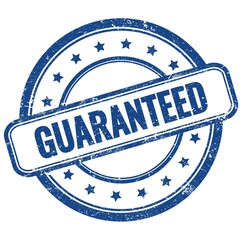 GUARANTEED text on blue grungy round rubber stamp.