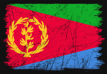 Creative grunge flag of Eritrea country. Happy independence day of Eritrea. Brush flag on shiny black background
