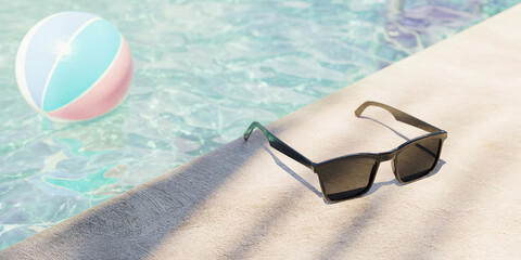 Close up of sunglasses on swimming pool