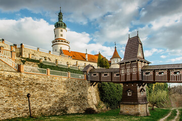 Old carved wooden Jurkovic bridge with charming castle tower in Nove Mesto nad Metuji, pearl of...