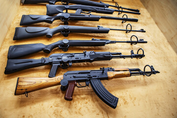 Pneumatic guns on a shop window. Trade in sports weapons of various types and capacities. Many...