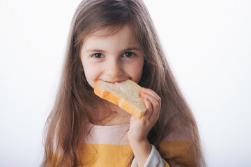 Little girl hold slice of homemade healthy bread