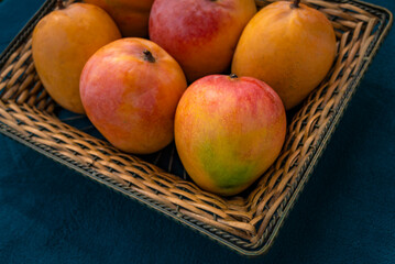 High angle view of mango fruits in a basket 