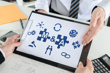 M&a concept on a clipboard