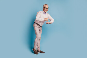 Photo of crazy dancing gentleman on blue color background