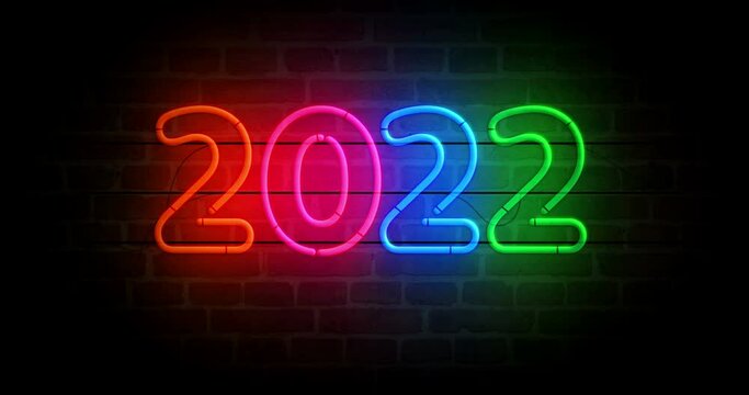 2022 year neon symbol on brick wall. Light color bulbs. Loopable and seamless abstract concept animation.