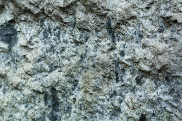 Naklejka premium The texture of a stone wall. Stonewall as a background or texture. Part of a stone wall, for background or texture