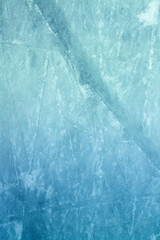 Surface of Outdoor Ice Rink Replete with Skate Marks. Ice Background.