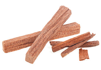 Chandan or red sandalwood sticks isolated on a white background