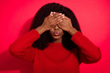 Portrait of attractive amorous girl closing eyes pout lips isolated over vivid red color background