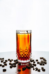 Cold brew coffee cocktail served over ice in a highball glass, espresso tonic, with copy space