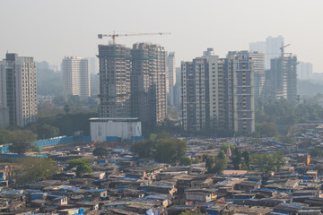 Slum redevelopment of mumbai maharashtra with towers and slums in one picture - obrazy, fototapety, plakaty