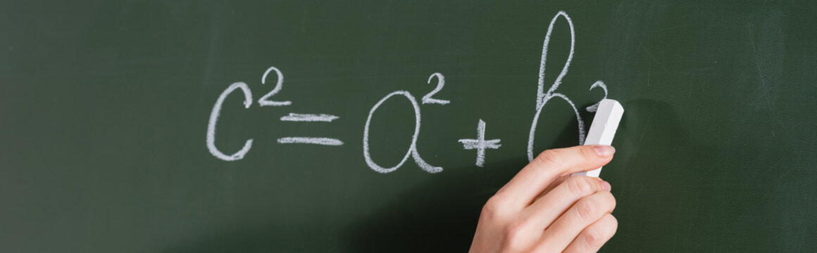 Cropped View Of Teacher Writing Equation On Chalkboard, Banner